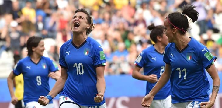 Italy net five against Jamaica to book spot in the knockout stages